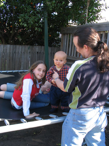 Playing on the trampoline with cousins Natasha and Domenic (8.5 months old)