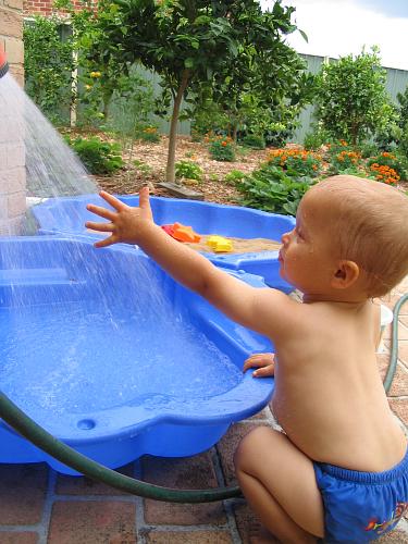 Playing in the pool (14 months)